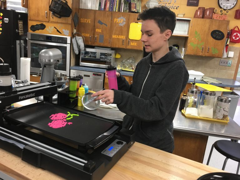 Student and pancake printer