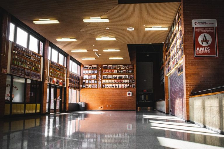 Ames high hallway with trophies and memorabilia