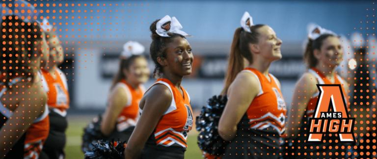 cheerleaders on the sideline during a football game
