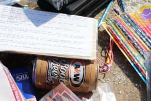 soda can, pencils, a VHS tape and written communication from the time capsule